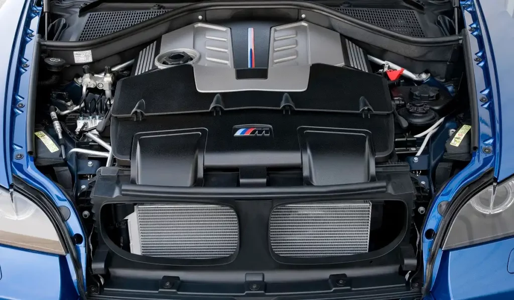 blue bmw x5 engine view under the hood